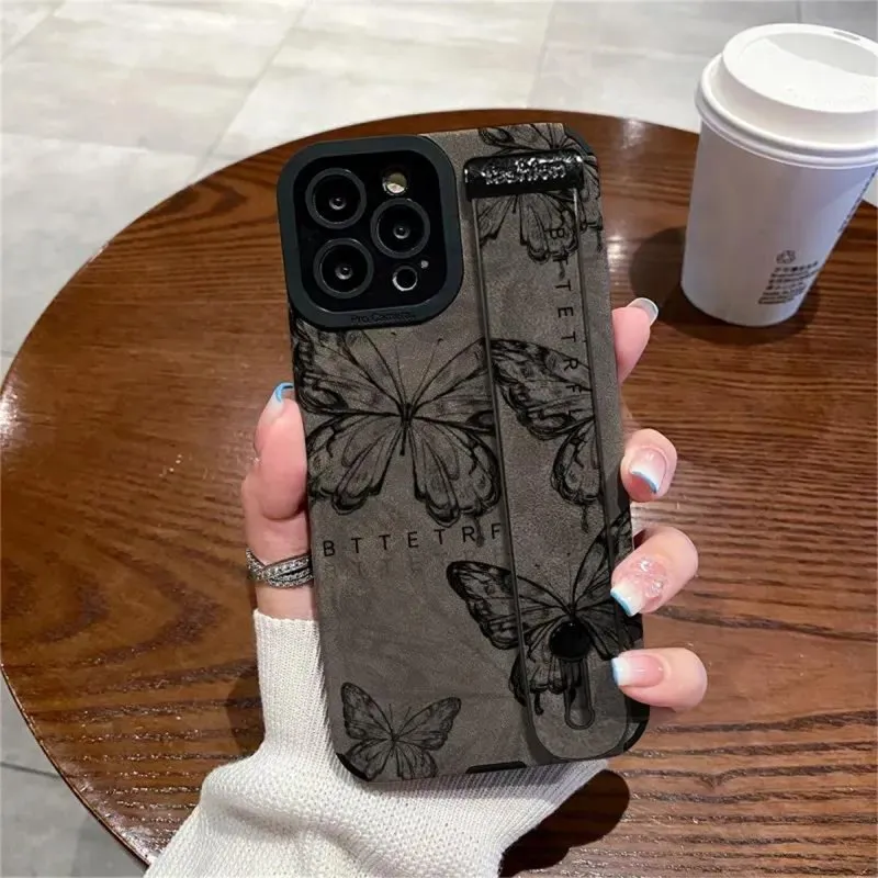 Futrola Black Butterfly sa drzacem za ruku za iPhone 17 / iPhone 18